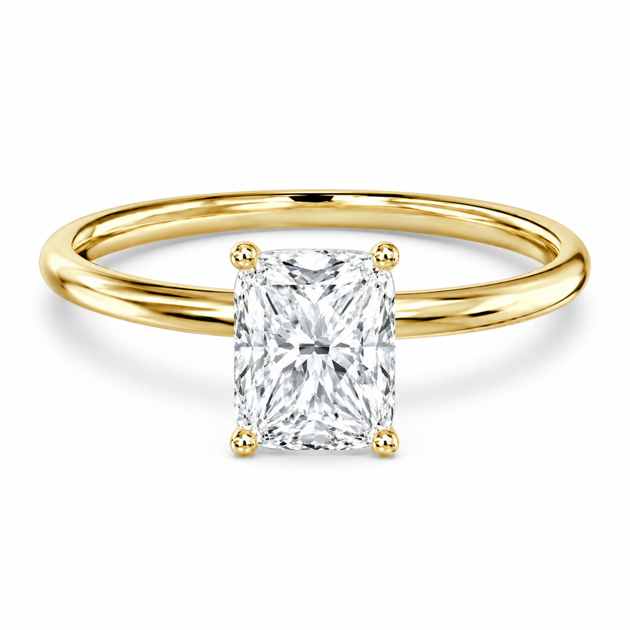 Front view of an elongated cushion-cut lab-grown diamond solitaire engagement ring in yellow gold