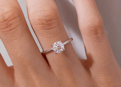 Elara Classic Round Cut Hidden Halo Engagement Ring - 1.0ct+. D & VVS2