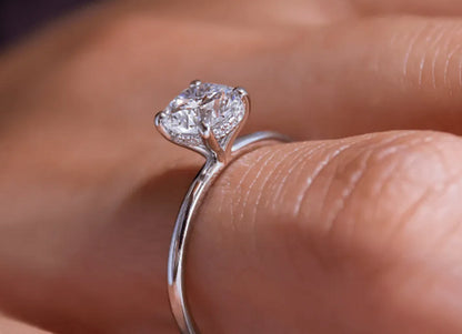 Elara Classic Round Cut Hidden Halo Engagement Ring - 1.0ct+. D & VVS2