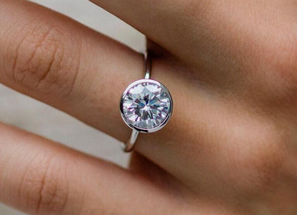 Nadir Classic Round Cut Bezel Engagement Ring - 1.0ct+. D & VVS2