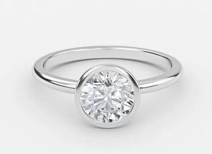 Nadir Classic Round Cut Bezel Engagement Ring - 1.0ct+. D & VVS2
