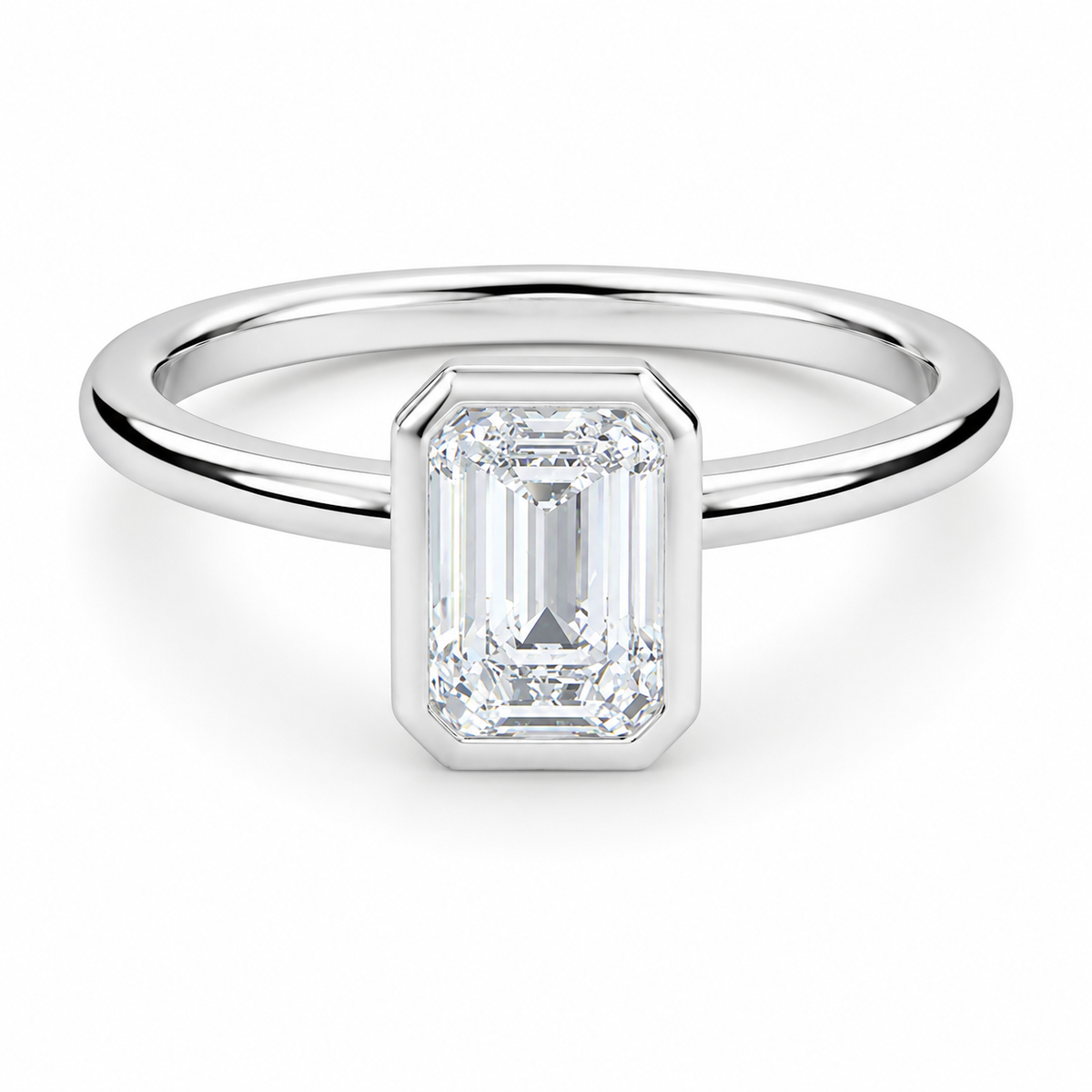 Front view of an emerald-cut lab-grown diamond bezel-set solitaire engagement ring in white gold