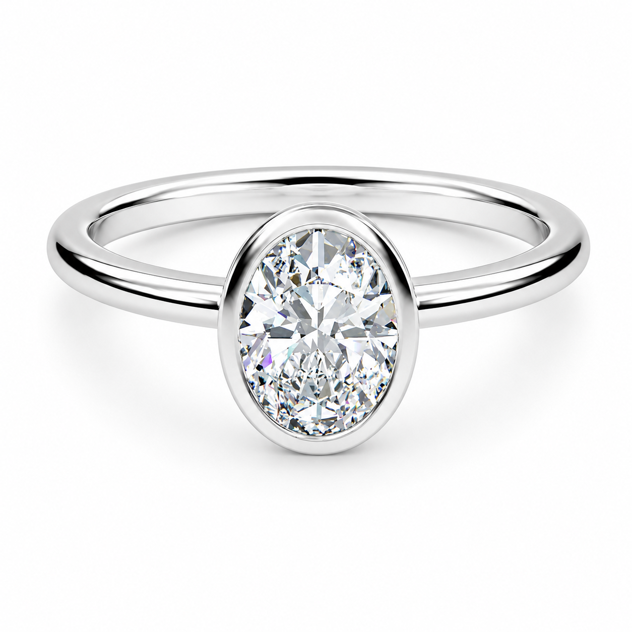 Front view of an oval-cut lab-grown diamond bezel-set solitaire engagement ring in white gold