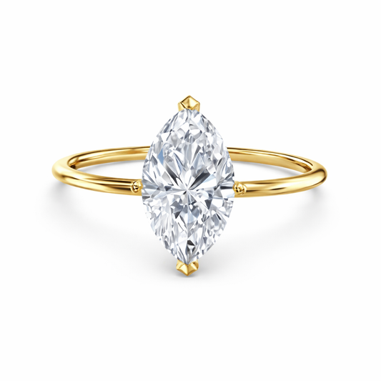 Front view of a marquise-cut lab-grown diamond solitaire engagement ring in yellow gold