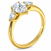 Rear view of an oval-cut lab-grown diamond trilogy engagement ring in yellow gold
