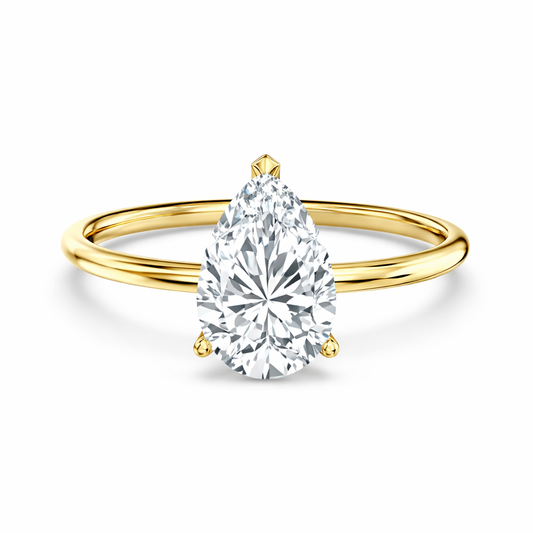 Front view of a pear-cut lab-grown diamond solitaire engagement ring in yellow gold
