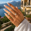 Radiant-cut lab-grown diamond solitaire engagement ring worn on hand