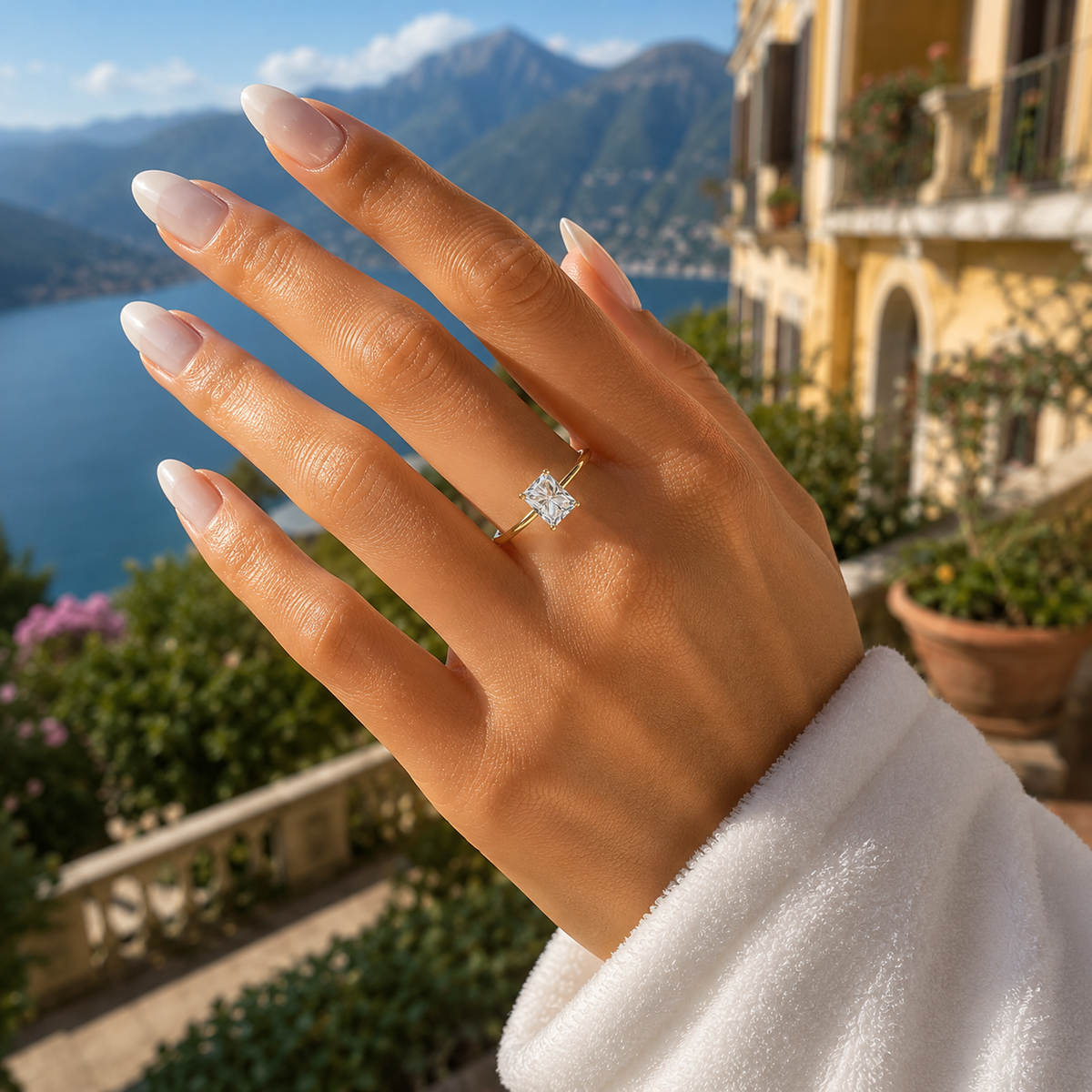 Radiant-cut lab-grown diamond solitaire engagement ring worn on hand