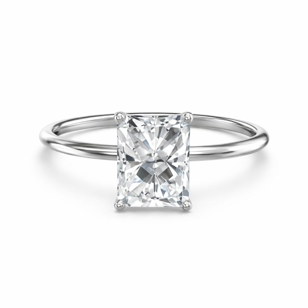 Front view of a radiant-cut lab-grown diamond solitaire engagement ring in white gold