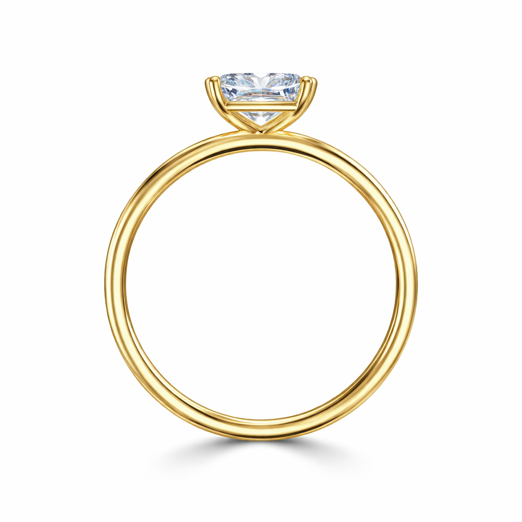Angled view of a radiant-cut lab-grown diamond solitaire engagement ring in yellow gold