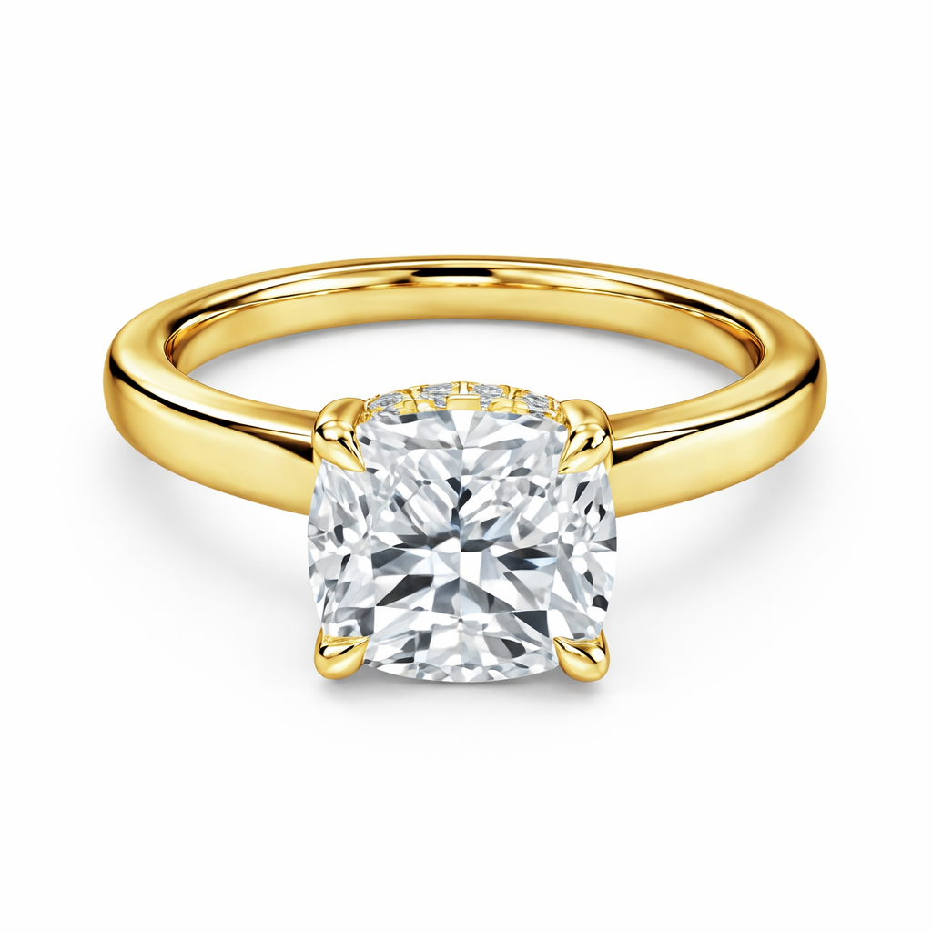 Front view of a cushion-cut lab-grown diamond hidden halo engagement ring in yellow gold