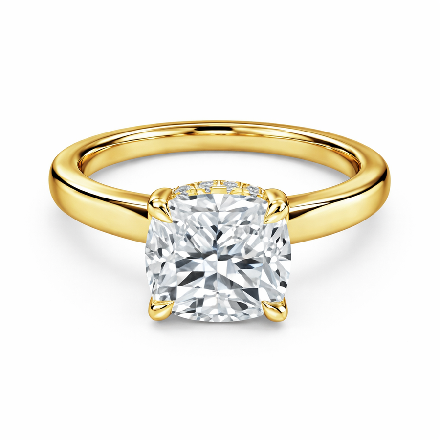 Front view of a cushion-cut lab-grown diamond hidden halo engagement ring in yellow gold