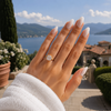 Cushion-cut lab-grown diamond hidden halo engagement ring worn on hand
