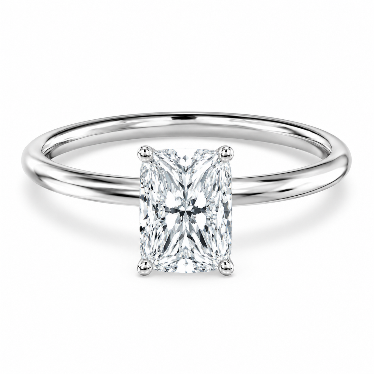 Front view of an elongated cushion-cut lab-grown diamond solitaire engagement ring in white gold