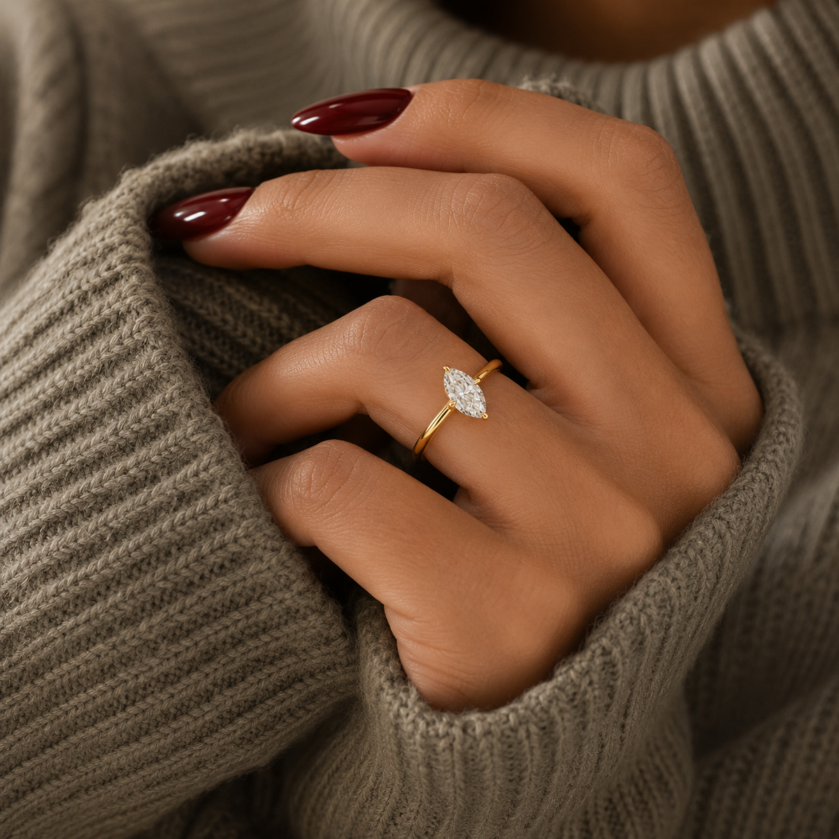 Marquise-cut lab-grown diamond hidden halo engagement ring lifestyle close-up
