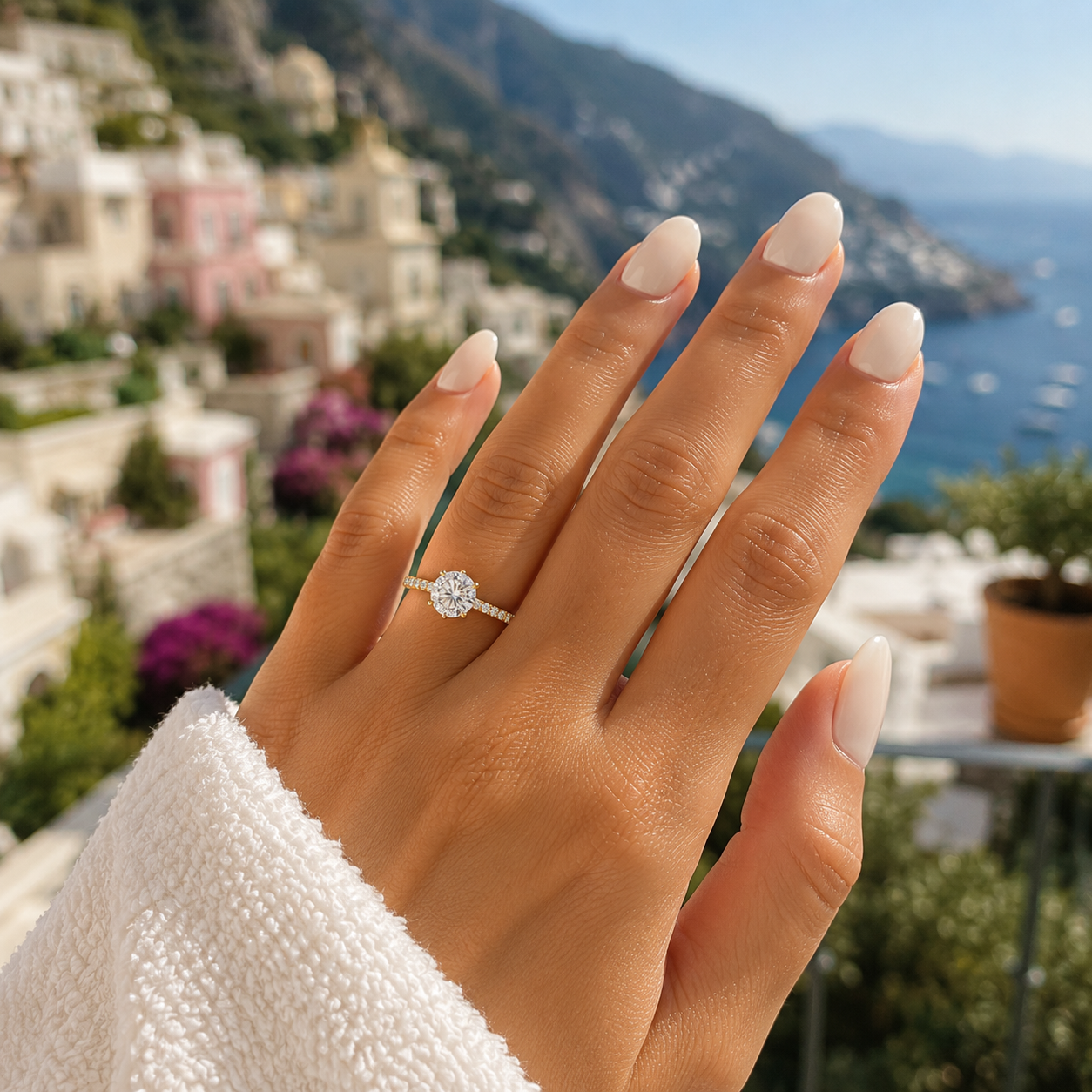 Oval-cut lab-grown diamond hidden halo pavé engagement ring worn on hand
