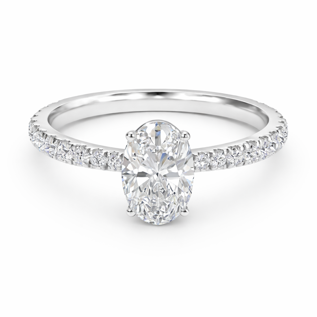 Front view of an oval-cut lab-grown diamond pavé solitaire engagement ring in white gold