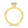 Angled view of a radiant-cut lab-grown diamond hidden halo engagement ring in yellow gold