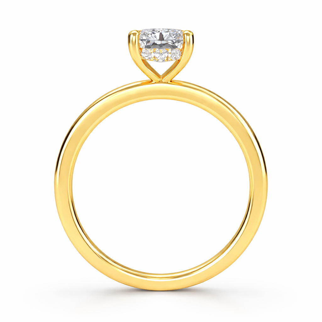 Angled view of a radiant-cut lab-grown diamond hidden halo engagement ring in yellow gold