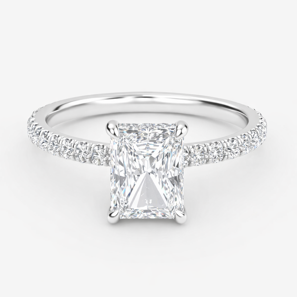 Front view of a radiant-cut lab-grown diamond hidden halo pavé engagement ring in white gold