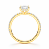 Angled view of a radiant-cut lab-grown diamond hidden halo pavé engagement ring in yellow gold